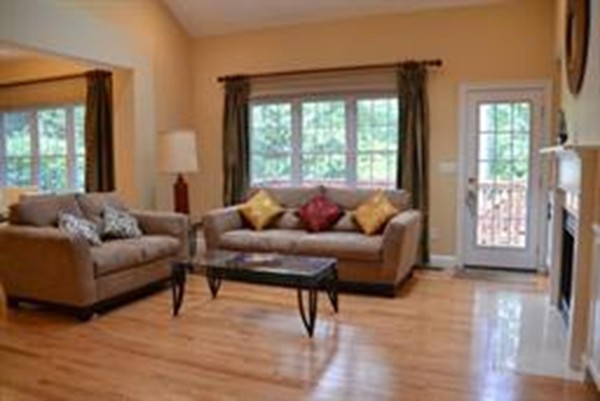 3 Indian Woods Way, Unit 3 Canton, MA 02021 - Photo 6 of 10 a living room with furniture and a large window