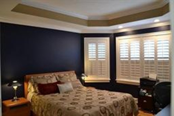 3 Indian Woods Way, Unit 3 Canton, MA 02021 - Photo 7 of 10 a bedroom with a bed and wooden floor