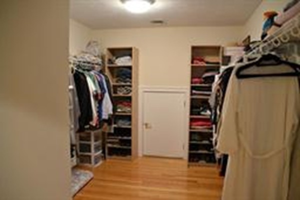 3 Indian Woods Way, Unit 3 Canton, MA 02021 - Photo 10 of 10 a view of walk in closet with clothes and shoes