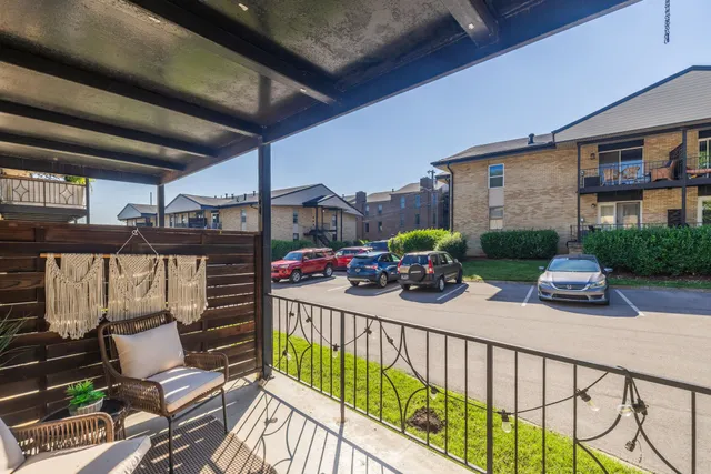 a view of a porch with furniture