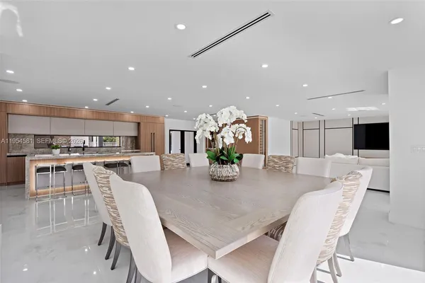 a living room with furniture and a table