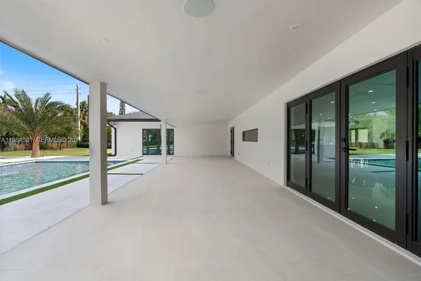 a bathroom with a granite countertop sink mirror and vanity