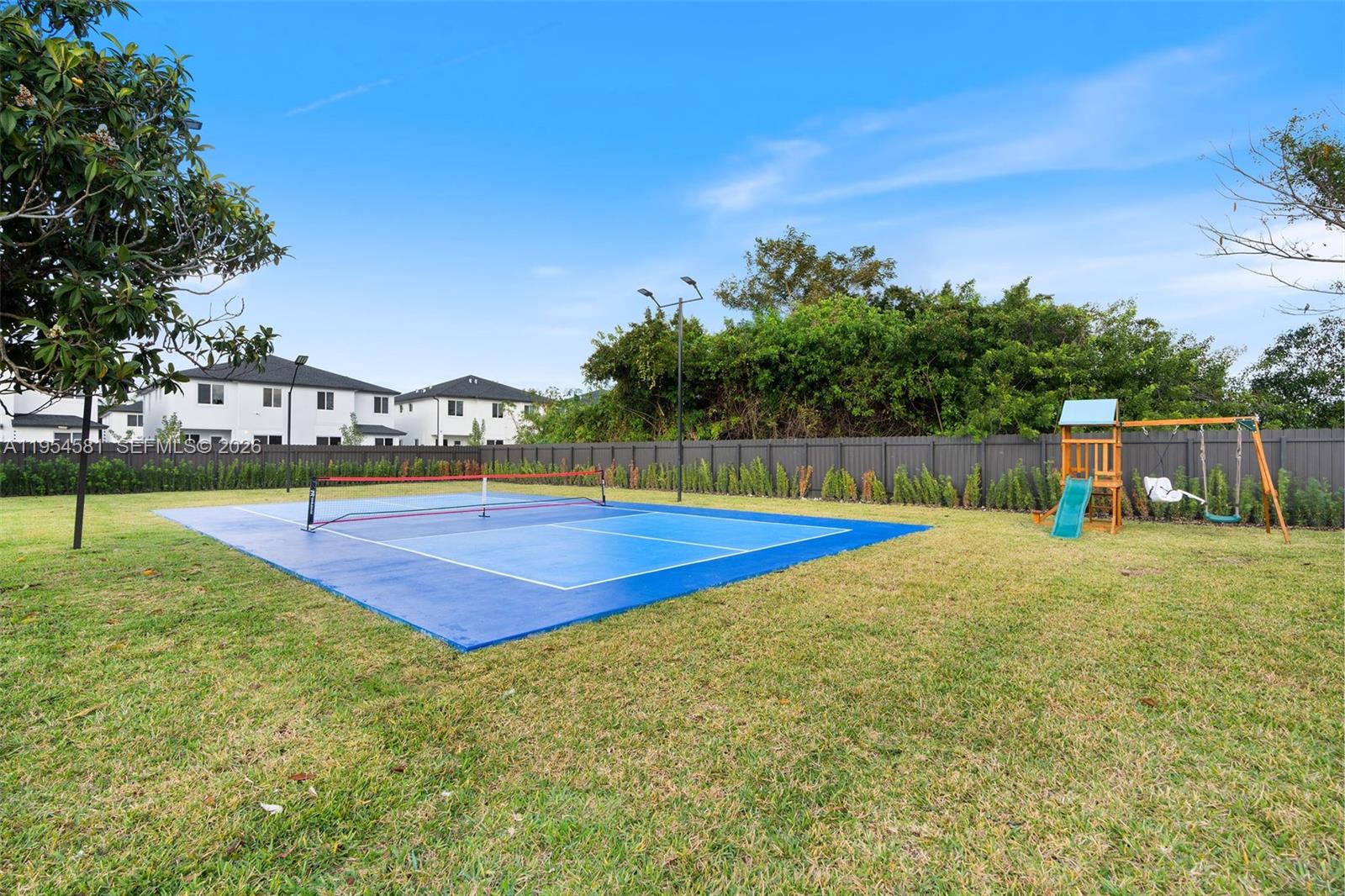 12425 Southwest 226th Street Miami, FL 33170 - Photo 66 of 75 a view of a basket ball ground