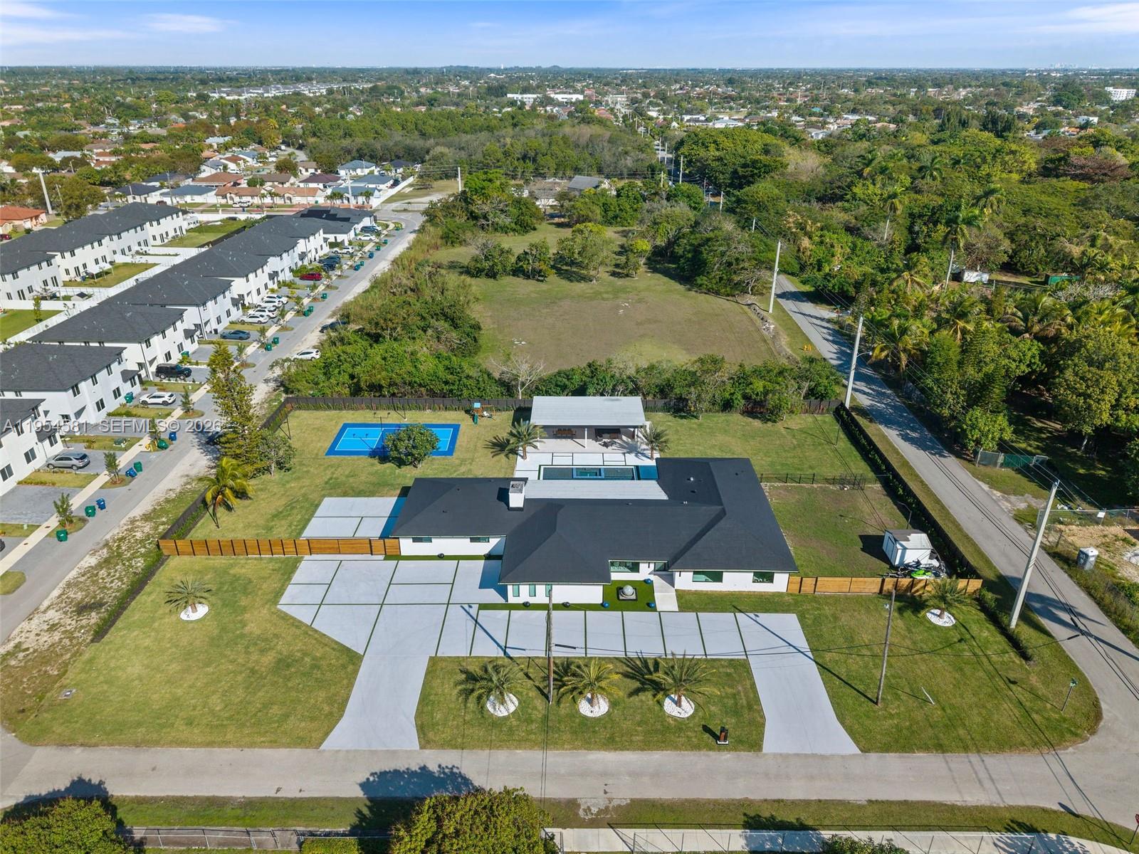 12425 Southwest 226th Street Miami, FL 33170 - Photo 74 of 75 a view of an outdoor space pool patio and outdoor seating