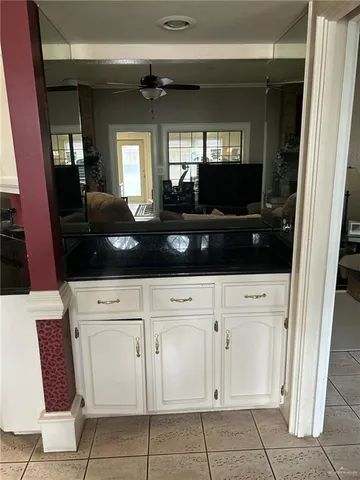 a view of a backyard of the house