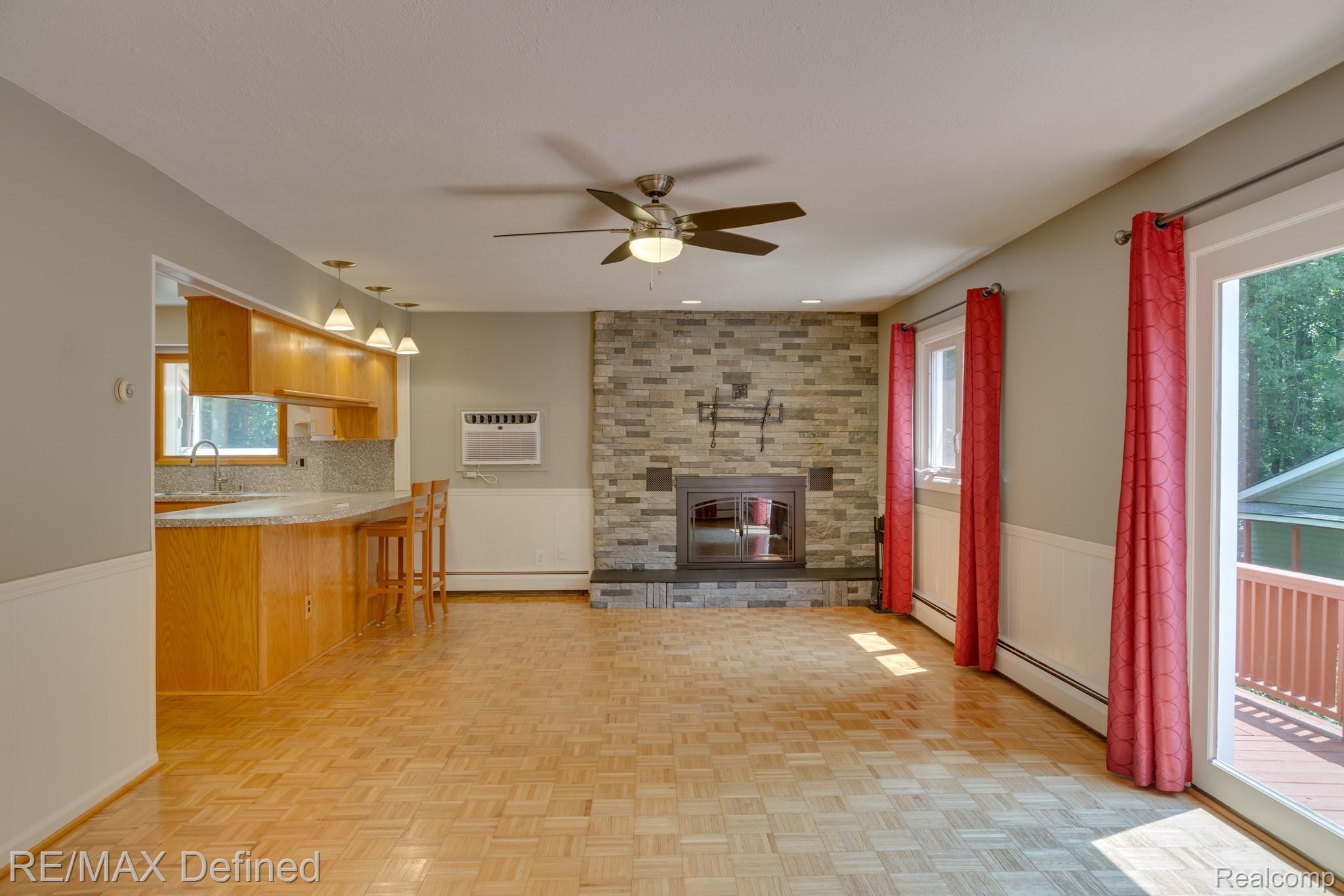 66050 Campground Road Washington, MI 48095 - Photo 12 of 31 Family room with fireplace