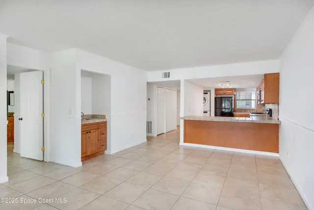 a view of a kitchen with a sink