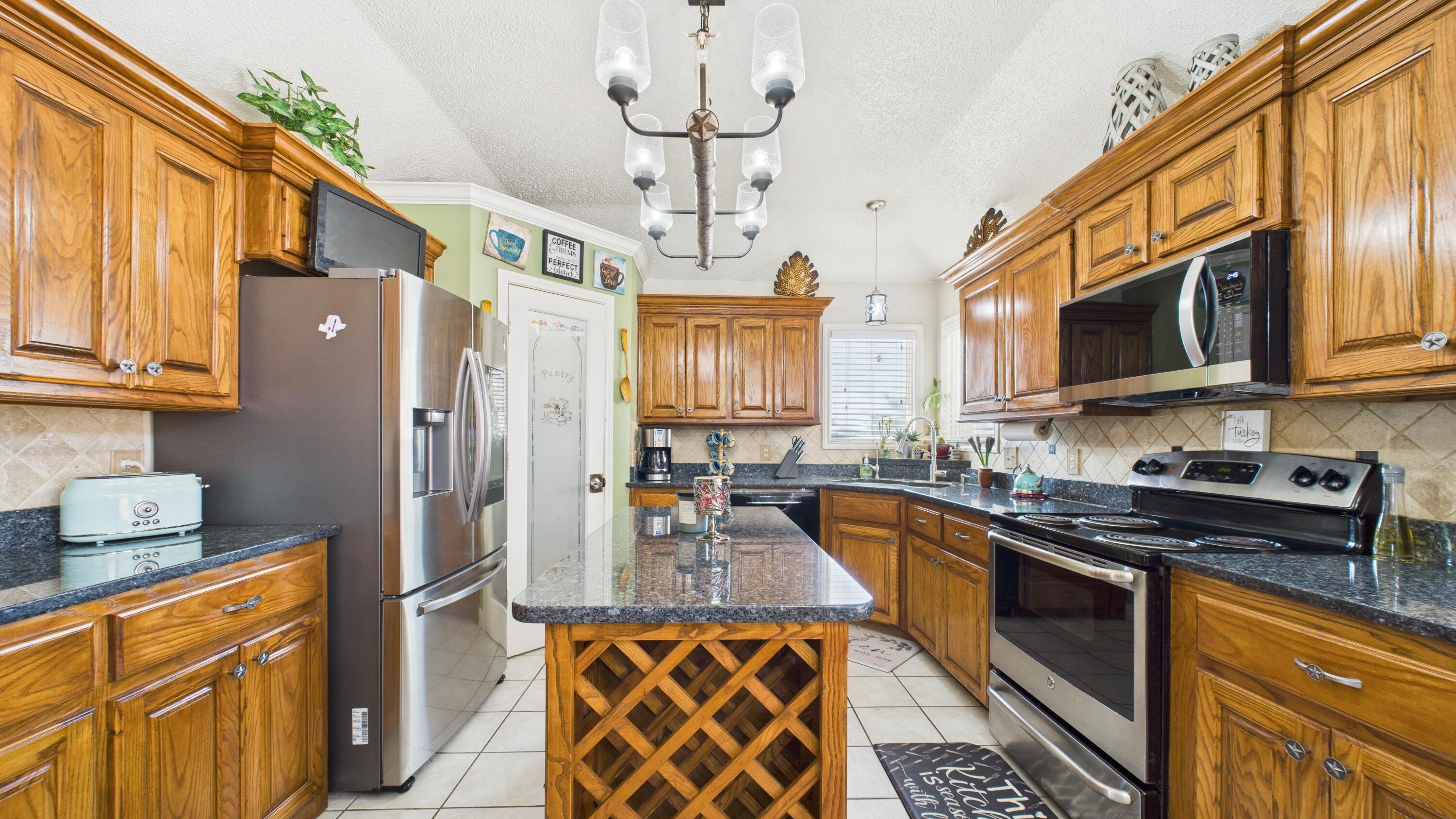 2909 146th Street Lubbock, TX 79423 - Photo 25 of 76 2909-146th-St_Lubbock-TX_27_Kitchen