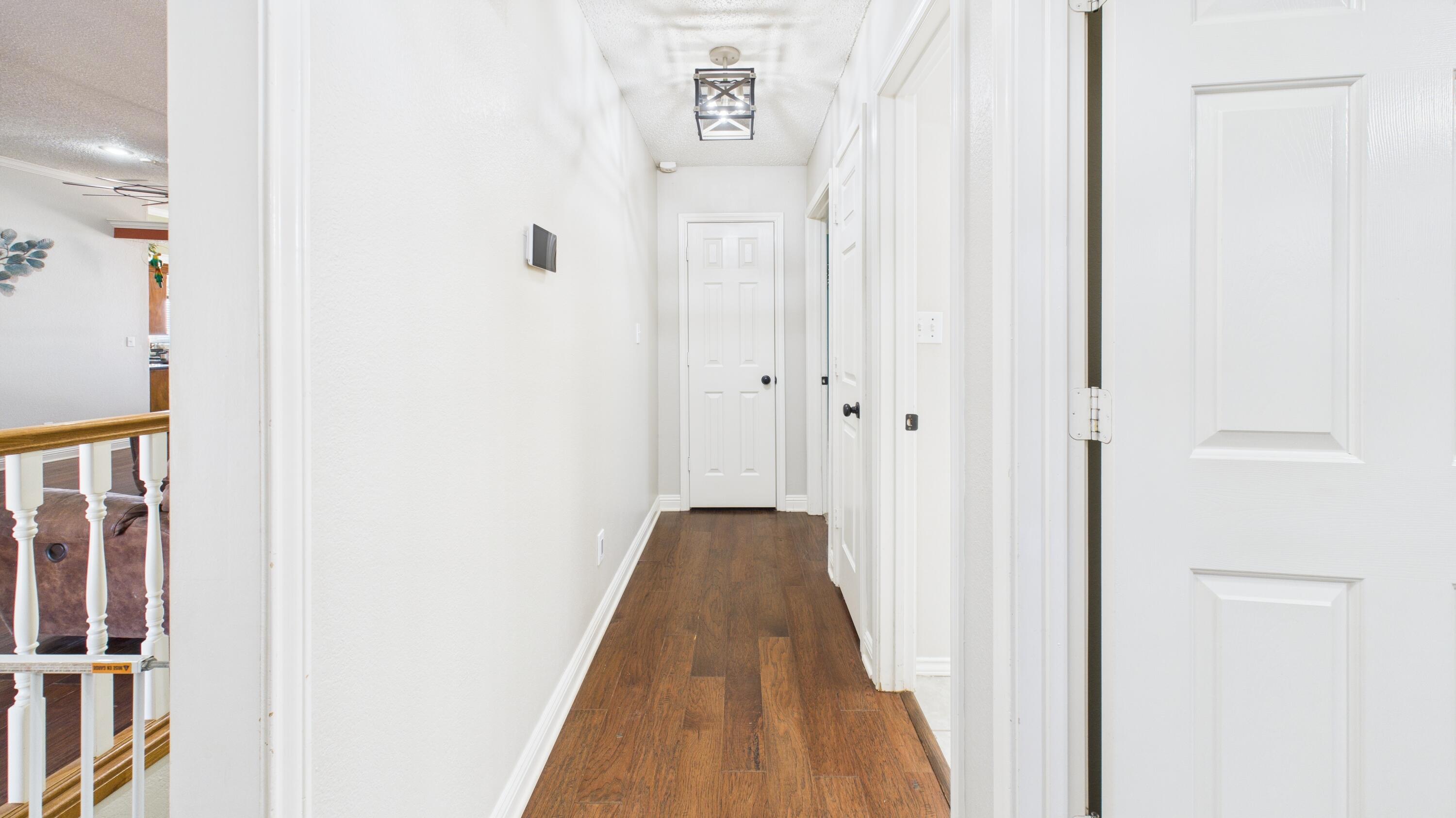 2909 146th Street Lubbock, TX 79423 - Photo 44 of 76 2909-146th-St_Lubbock-TX_52_Hallway