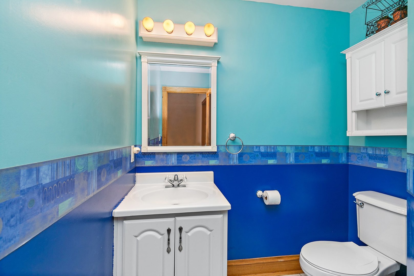 5N988 Meredith Road Maple Park, IL 60151 - Photo 12 of 38 a bathroom with a sink a toilet and mirror