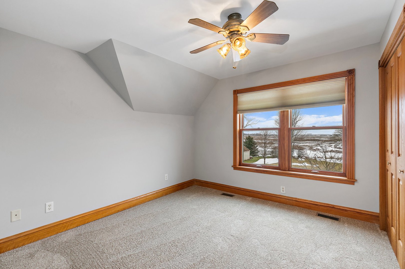 5N988 Meredith Road Maple Park, IL 60151 - Photo 16 of 38 an empty room with a window and a fan