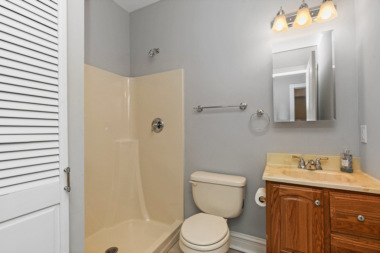 5N988 Meredith Road Maple Park, IL 60151 - Photo 25 of 38 a bathroom with a sink a toilet and shower
