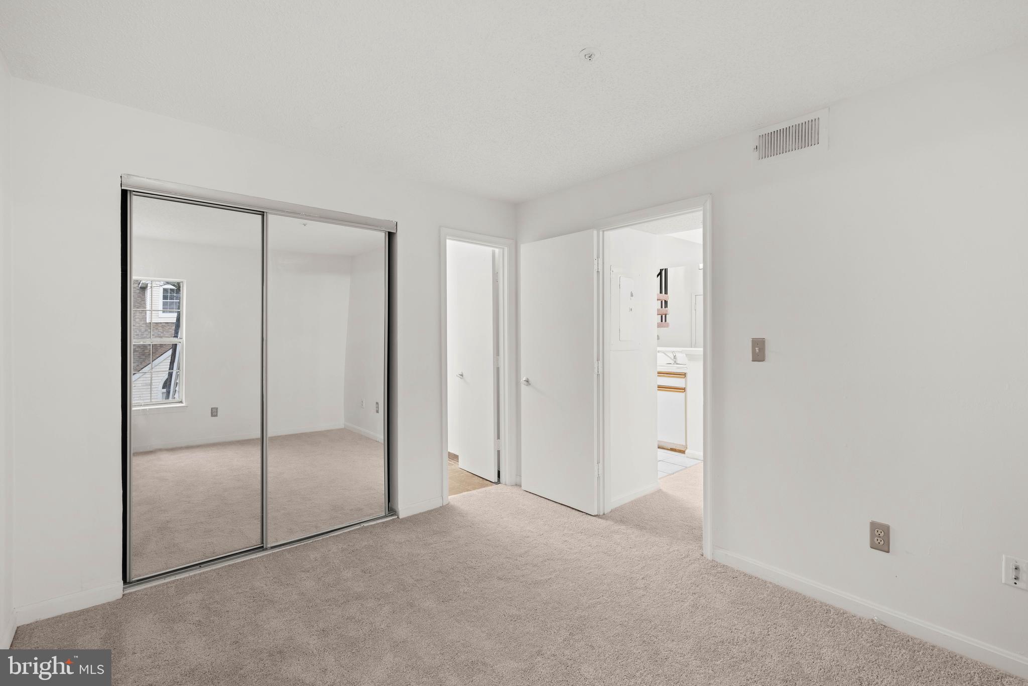 10419 Beacon Ridge Drive, Unit 302 Bowie, MD 20721 - Photo 15 of 26 Primary Bedroom