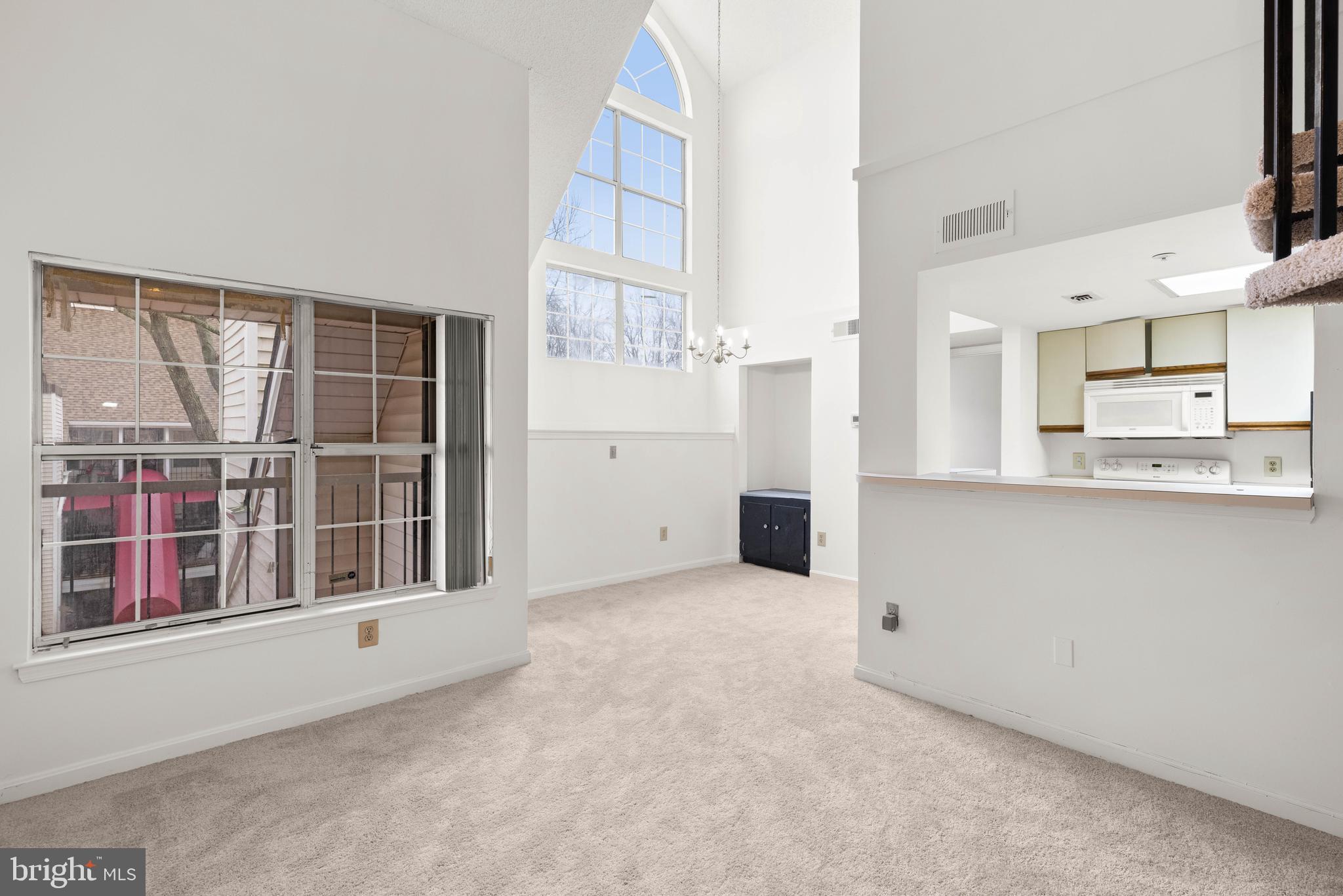 10419 Beacon Ridge Drive, Unit 302 Bowie, MD 20721 - Photo 3 of 26 Living Room with Cathedral Wondow