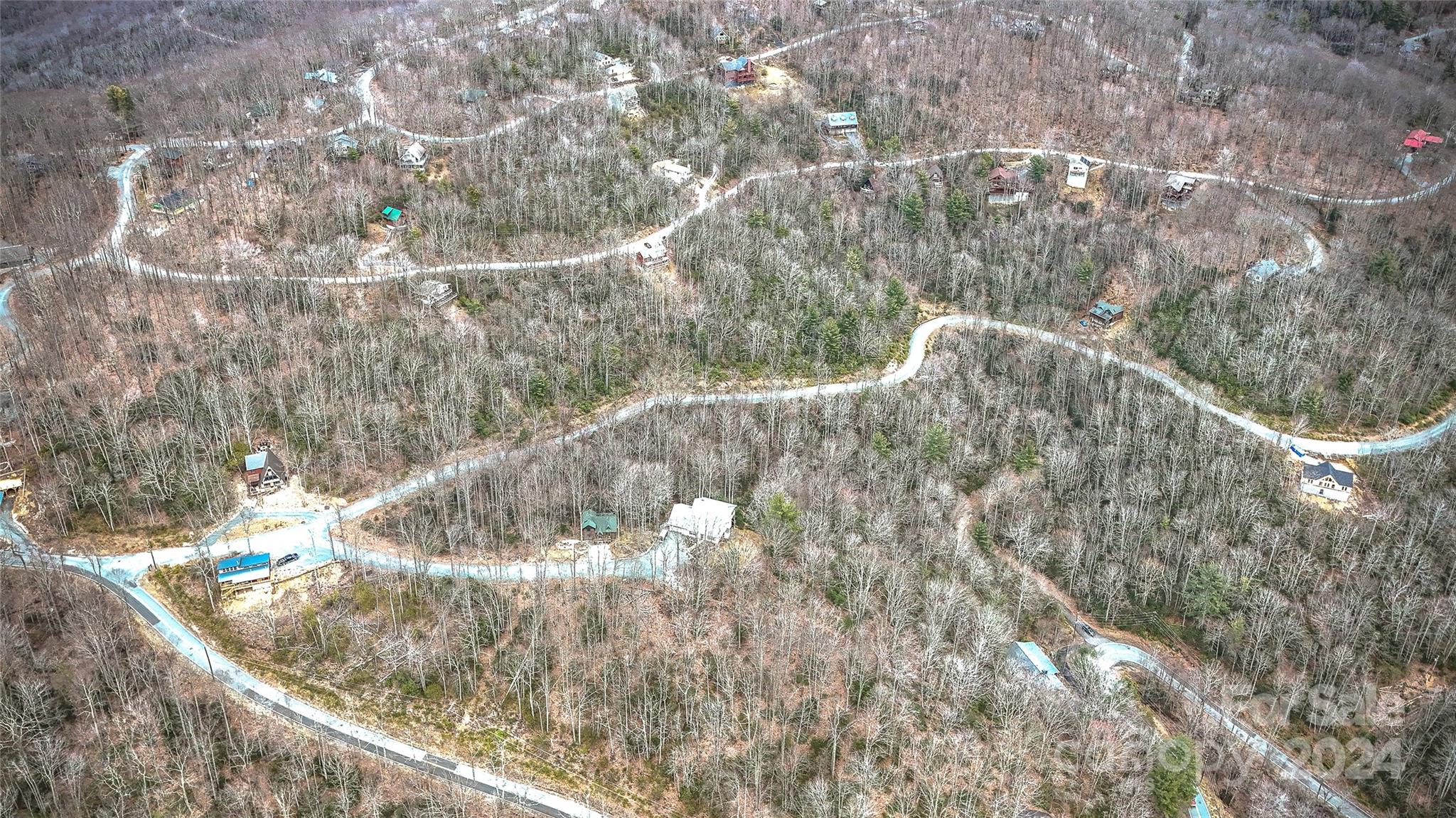 1121 Pine Ridge Road Beech Mountain, NC 28604 - Photo 7 of 18 a view of a forest from a window