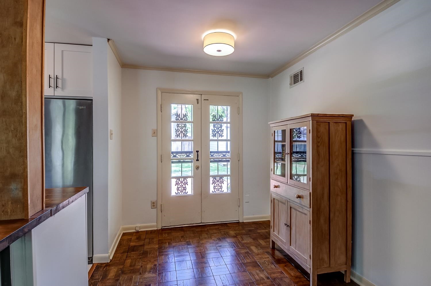 5056 Wingdale Road Memphis, TN 38117 - Photo 9 of 18 Doorway featuring ornamental molding, french doors, and parquet flooring