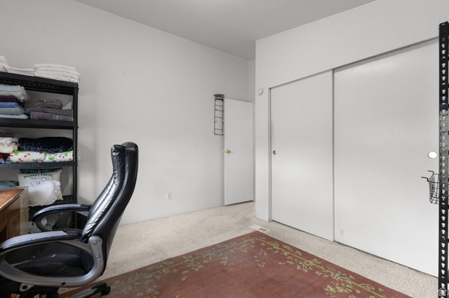 2600 North Hill Field Road, Unit 134 Layton, UT 84041 - Photo 27 of 41 Office area with light colored carpet