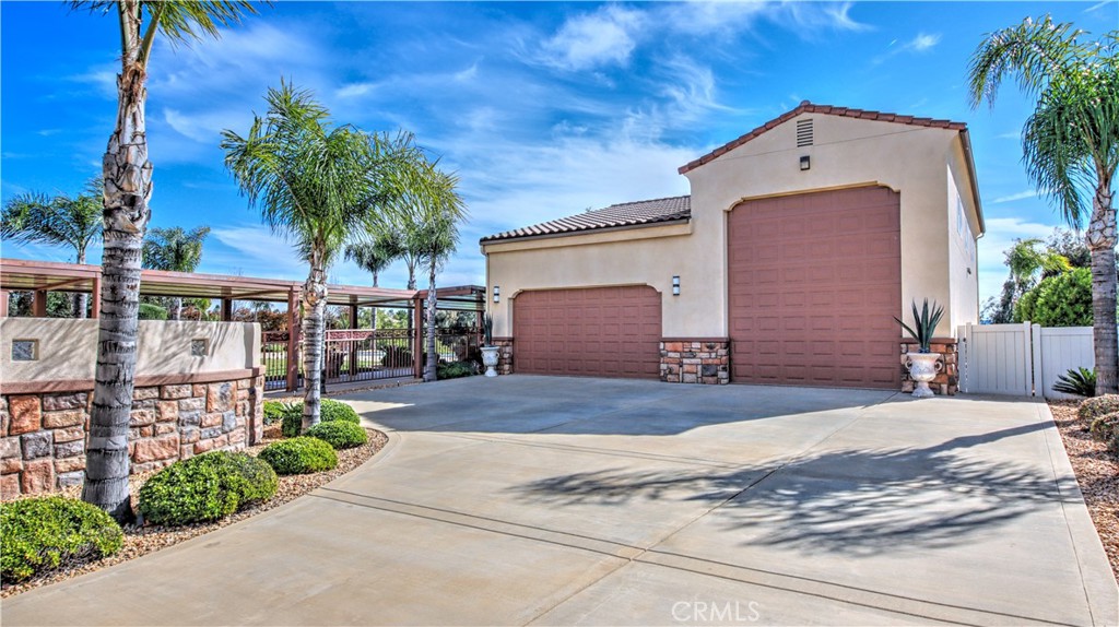 923 Union Street Cherry Valley, CA 92223 - Photo 39 of 68 a front view of a house with a yard and garage