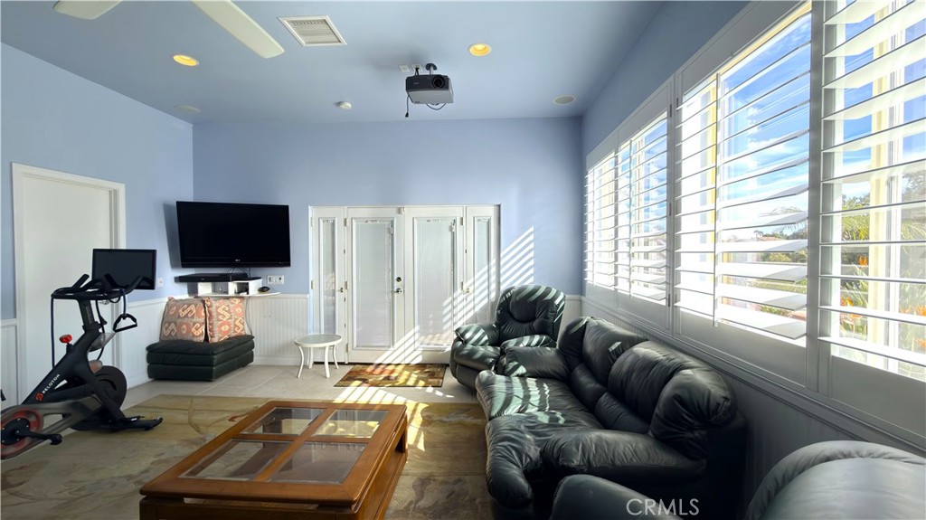 923 Union Street Cherry Valley, CA 92223 - Photo 42 of 68 a living room with furniture and a flat screen tv