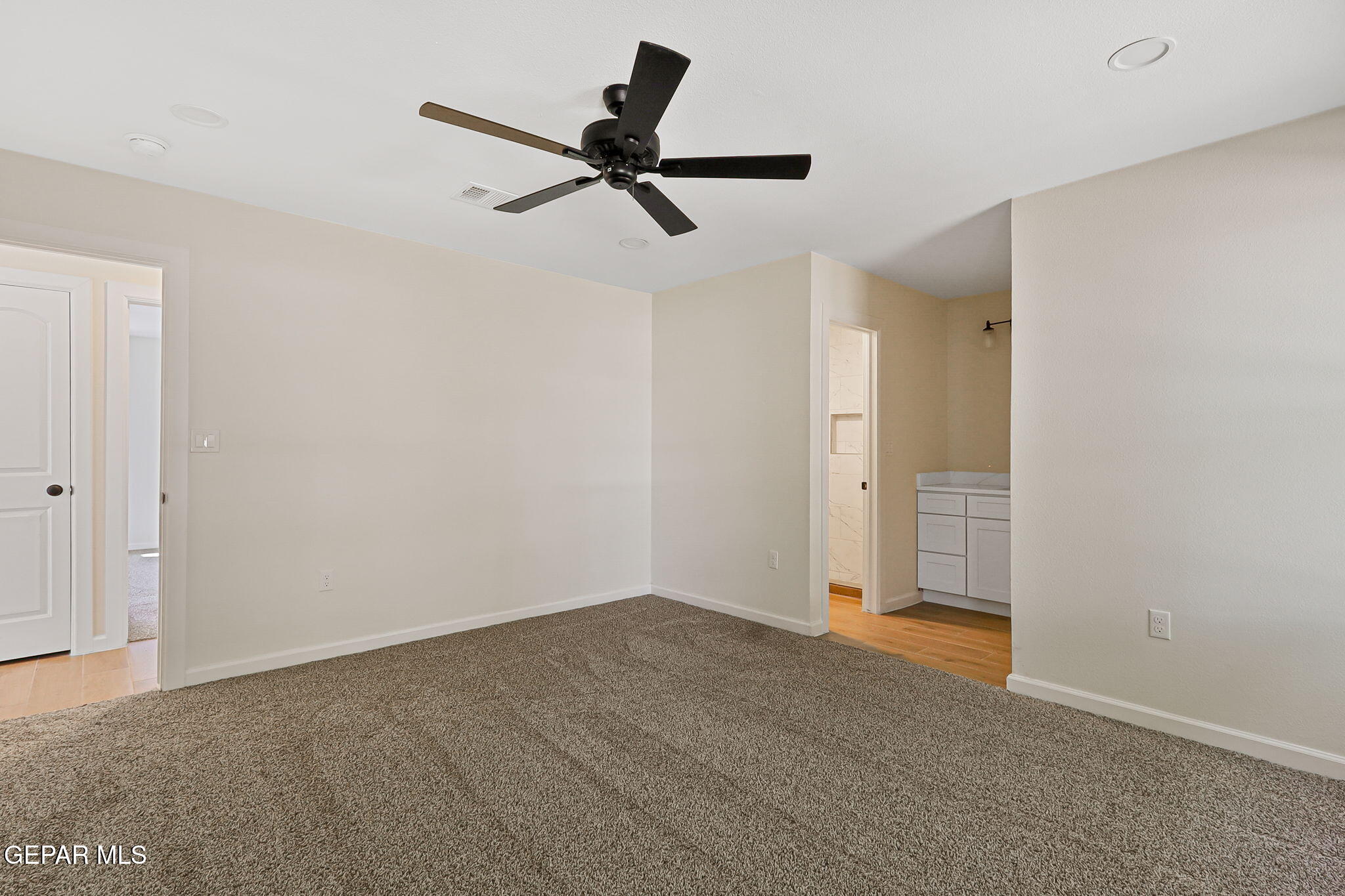 3428 Itasca Street El Paso, TX 79936 - Photo 17 of 34 a view of a livingroom with a ceiling fan and window