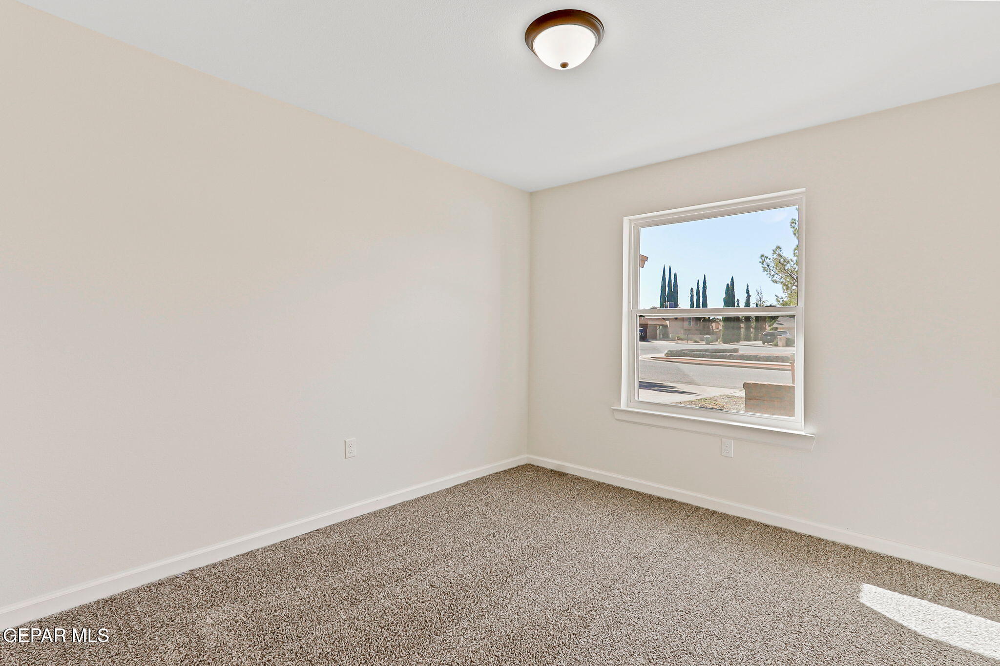 3428 Itasca Street El Paso, TX 79936 - Photo 21 of 34 an empty room with windows