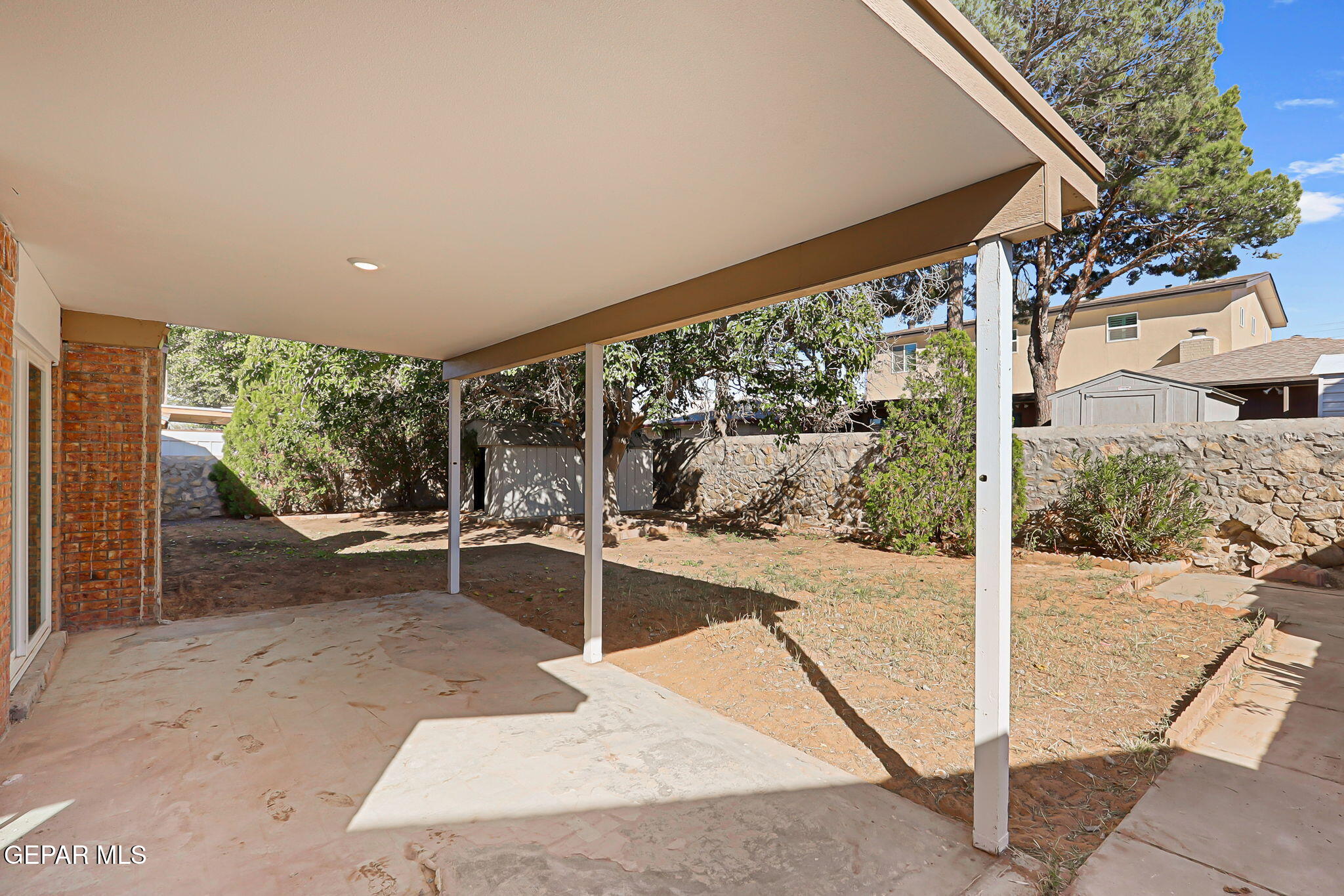 3428 Itasca Street El Paso, TX 79936 - Photo 29 of 34 a view of a patio with table and chairs with wooden floor and fence