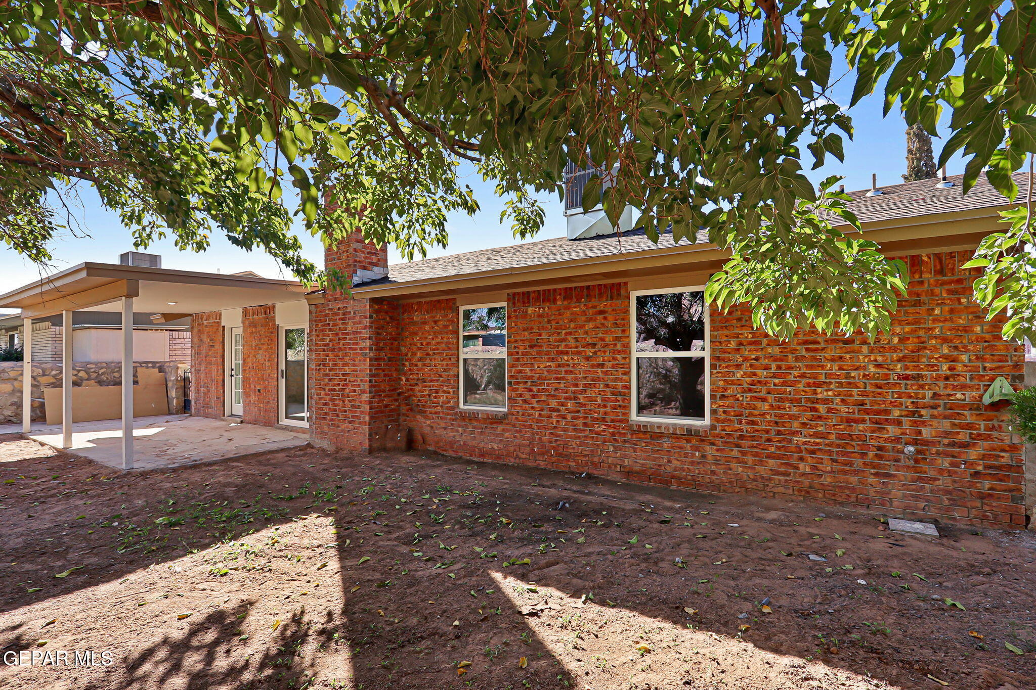 3428 Itasca Street El Paso, TX 79936 - Photo 33 of 34 a front view of a house with a garden