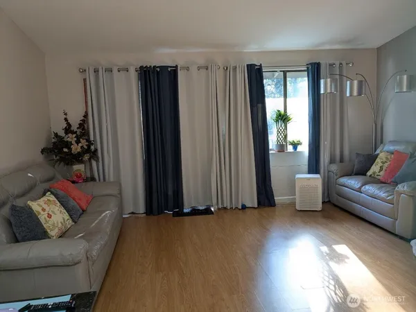 a living room with furniture and a couch