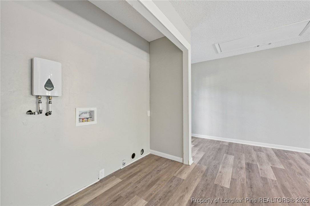 211 Lemuel Black Road Bunnlevel, NC 28323 - Photo 16 of 29 a view of room with hardwood floor