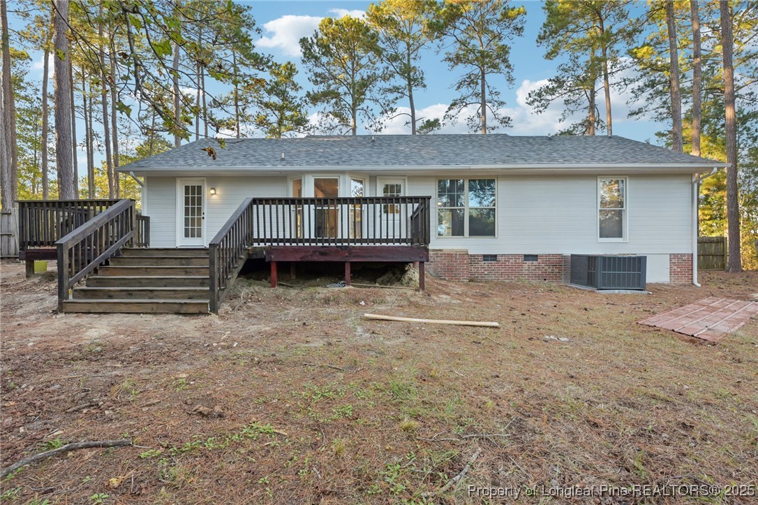 211 Lemuel Black Road Bunnlevel, NC 28323 - Photo 28 of 29 a view of a house with a balcony and stairs