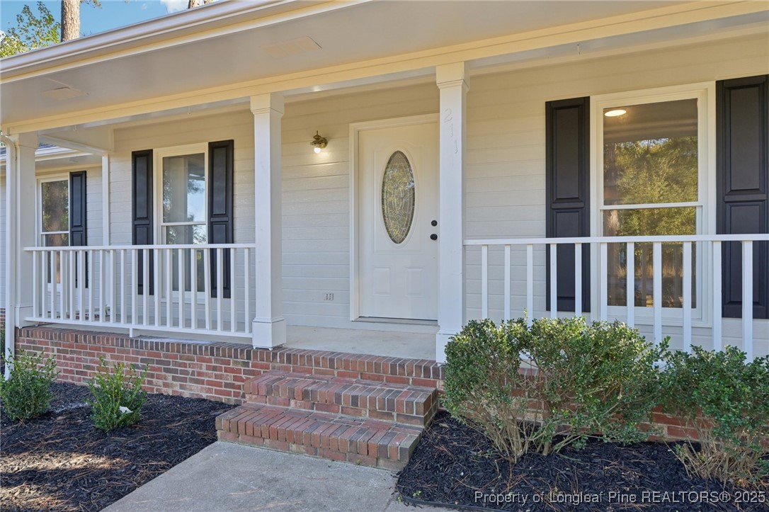 211 Lemuel Black Road Bunnlevel, NC 28323 - Photo 4 of 29 a house with a garden space