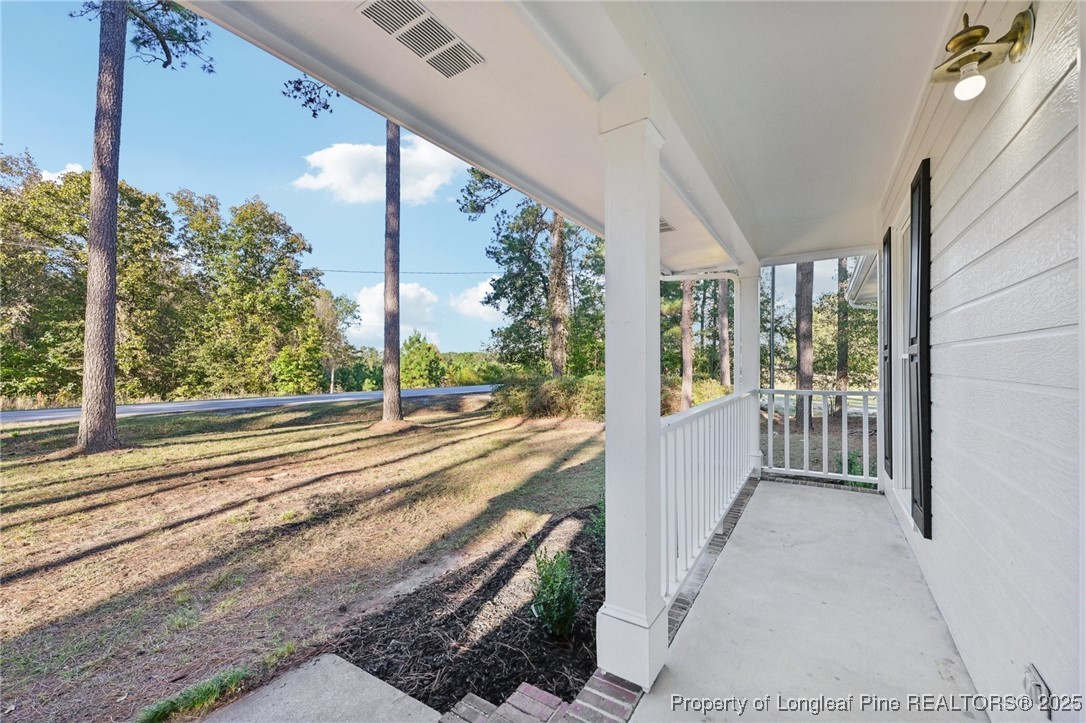211 Lemuel Black Road Bunnlevel, NC 28323 - Photo 5 of 29 a view of a balcony