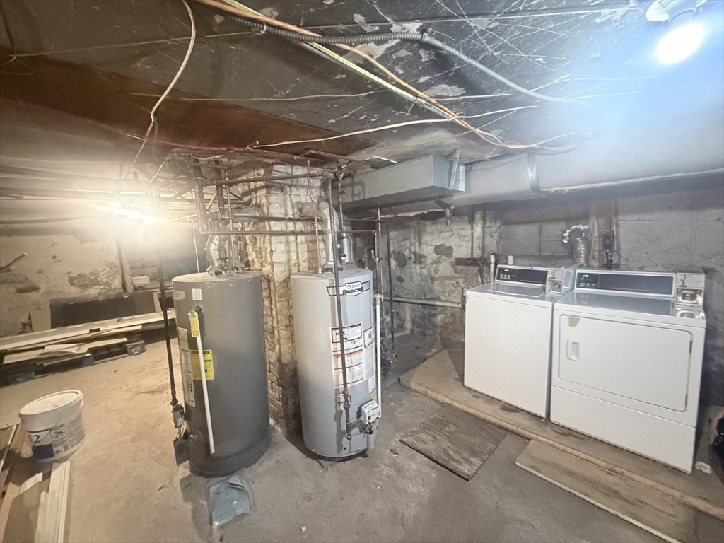1852 South Main Street Fall River, MA 02724 - Photo 19 of 21 a view of a storage & utility room with washer and dryer