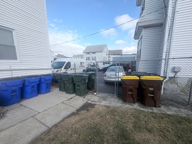 a view of a chairs and a sink in a patio