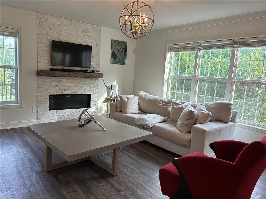 18 Dona Lea Road Perinton, NY 14450 - Photo 5 of 29 The great room is light-filled with ample space for gatherings.