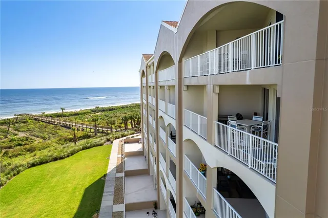 a view of balcony with furniture