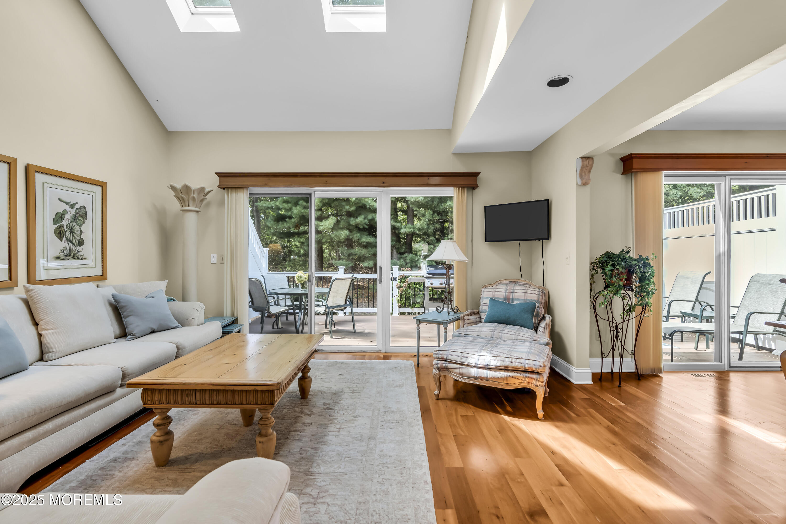 1301 Warren Avenue, Unit 5 Spring Lake, NJ 07762 - Photo 11 of 51 a living room with furniture and a large window