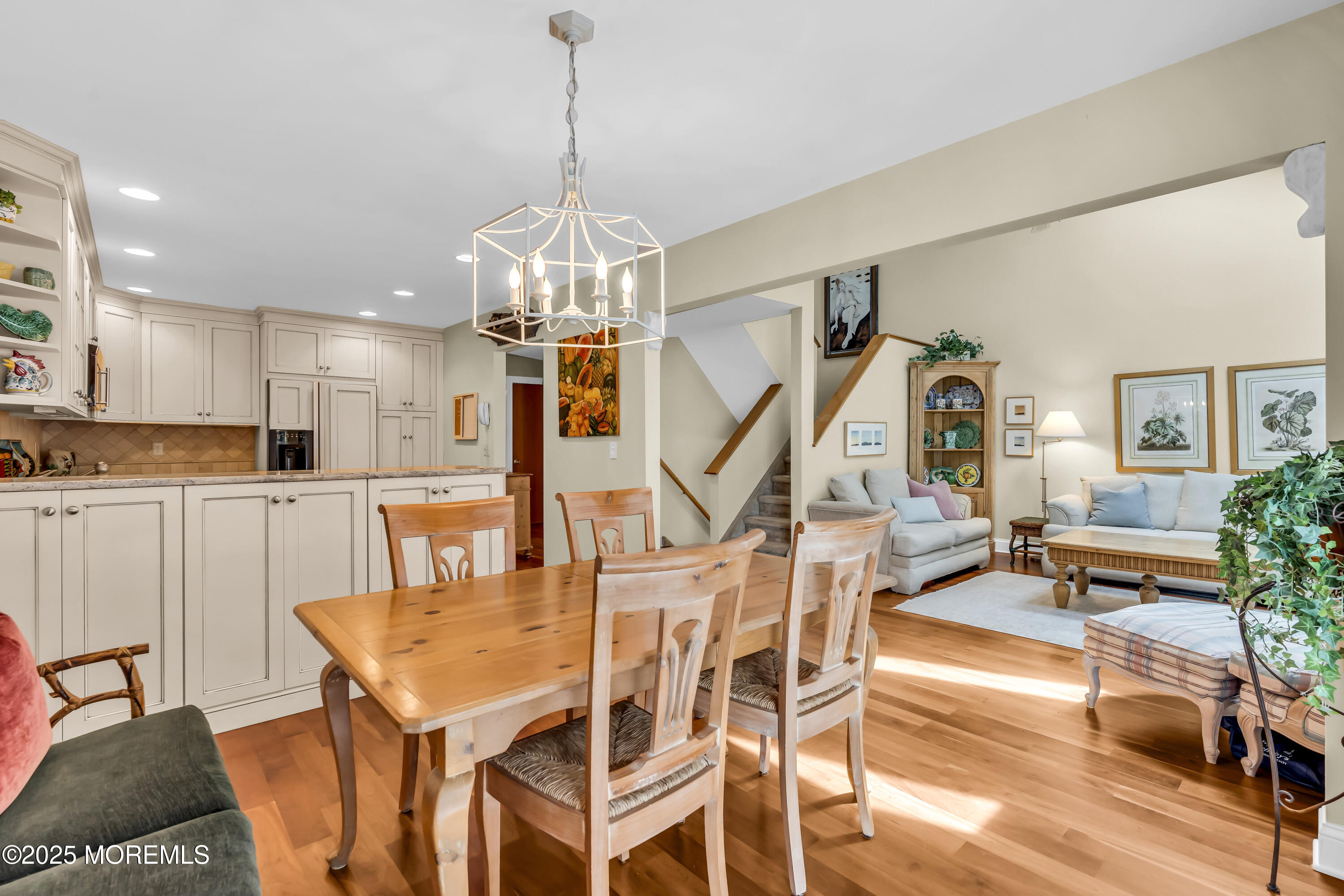 1301 Warren Avenue, Unit 5 Spring Lake, NJ 07762 - Photo 16 of 51 a view of a dining room with furniture and wooden floor