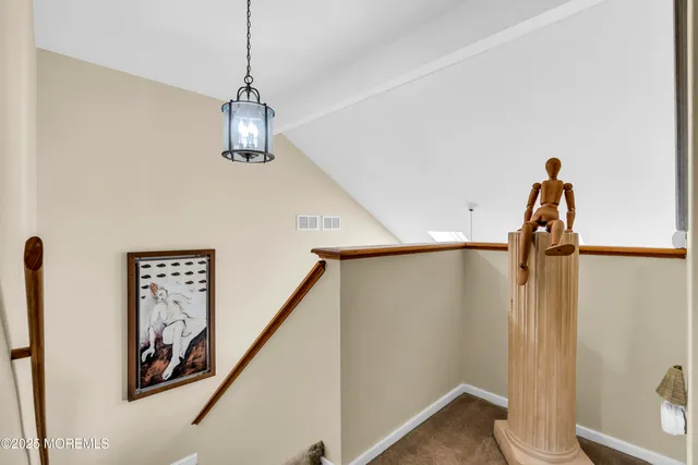 a view of a hallway with entryway