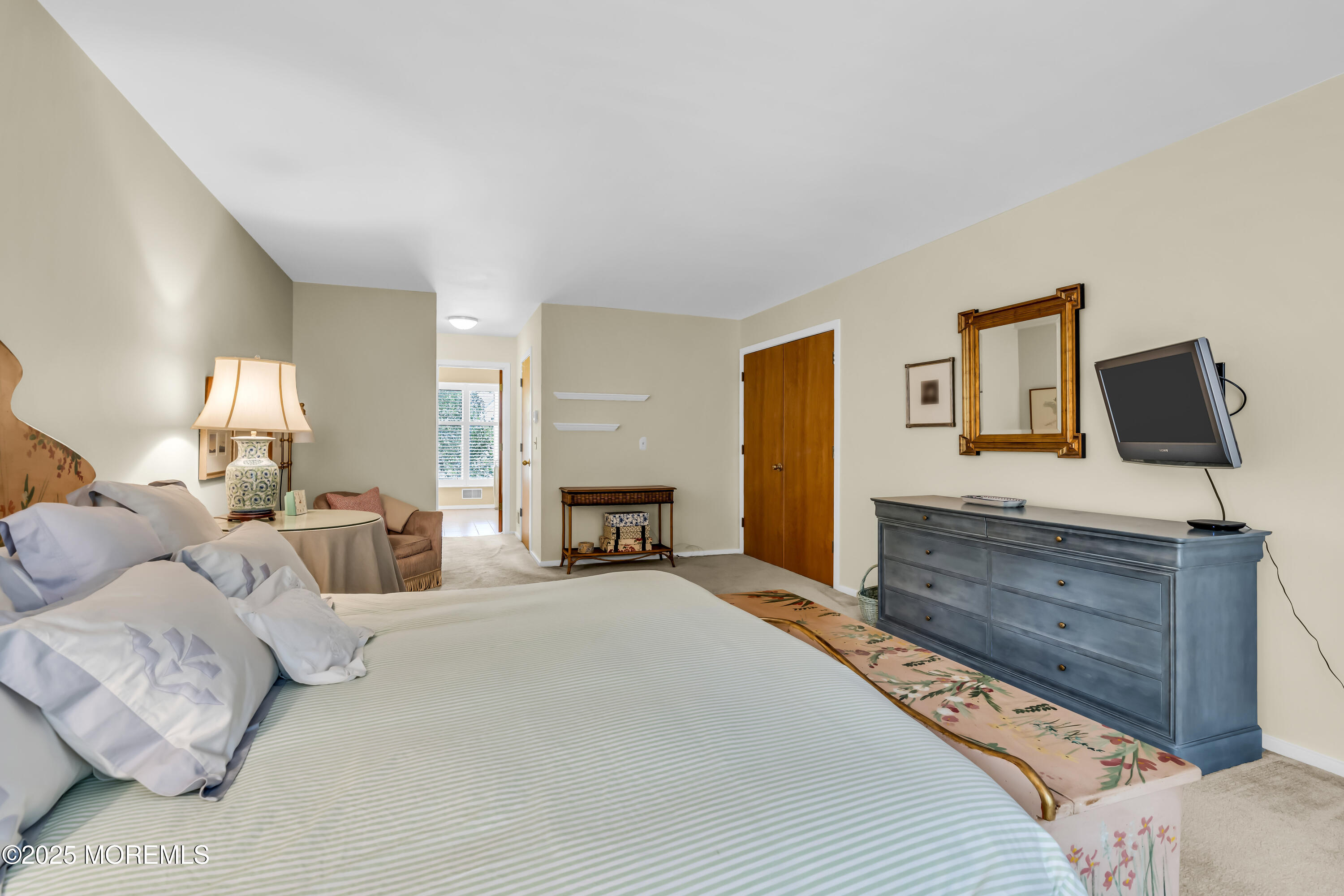 1301 Warren Avenue, Unit 5 Spring Lake, NJ 07762 - Photo 33 of 51 a bed room with a bed and a television