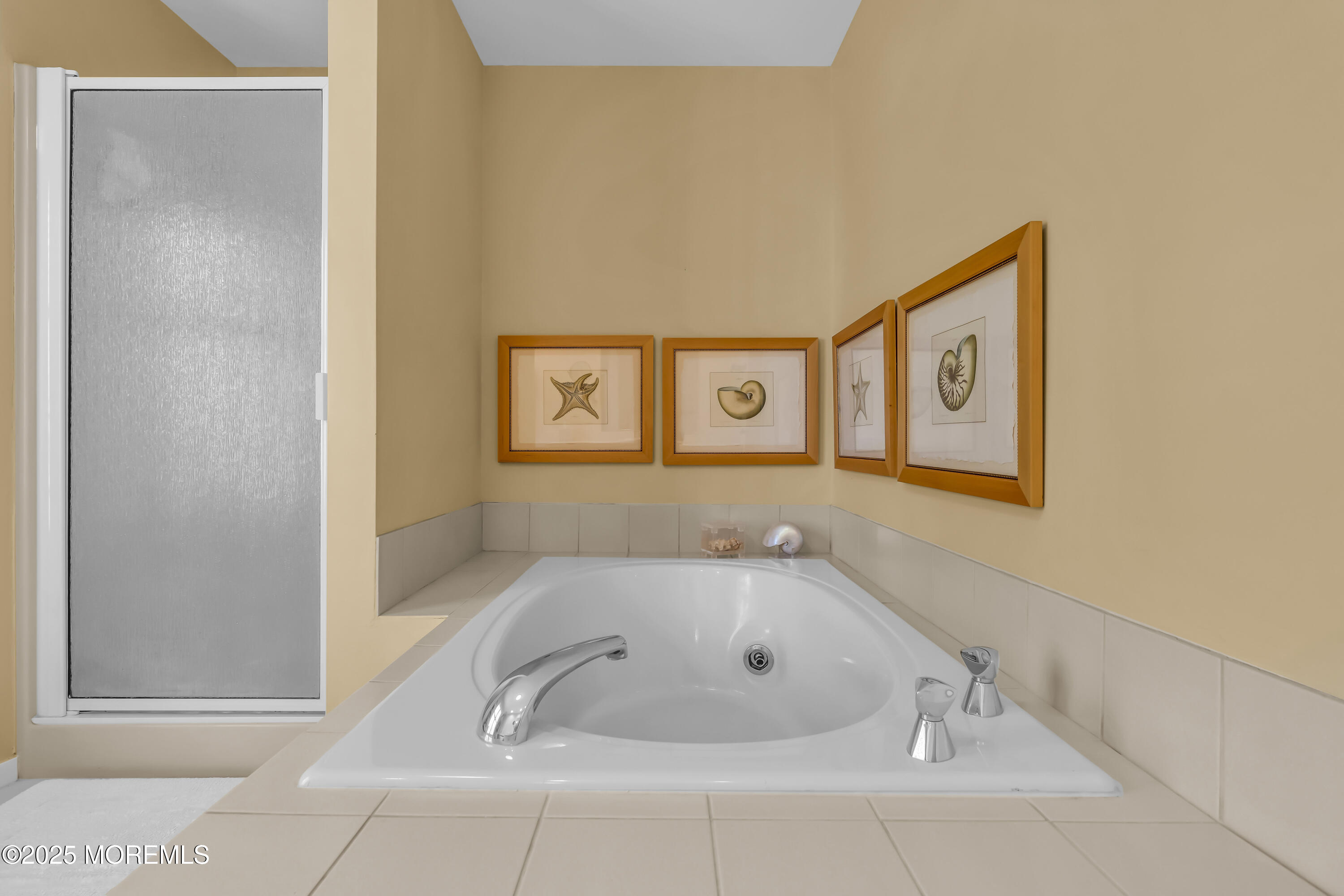 1301 Warren Avenue, Unit 5 Spring Lake, NJ 07762 - Photo 36 of 51 a bathroom with a tub and shower