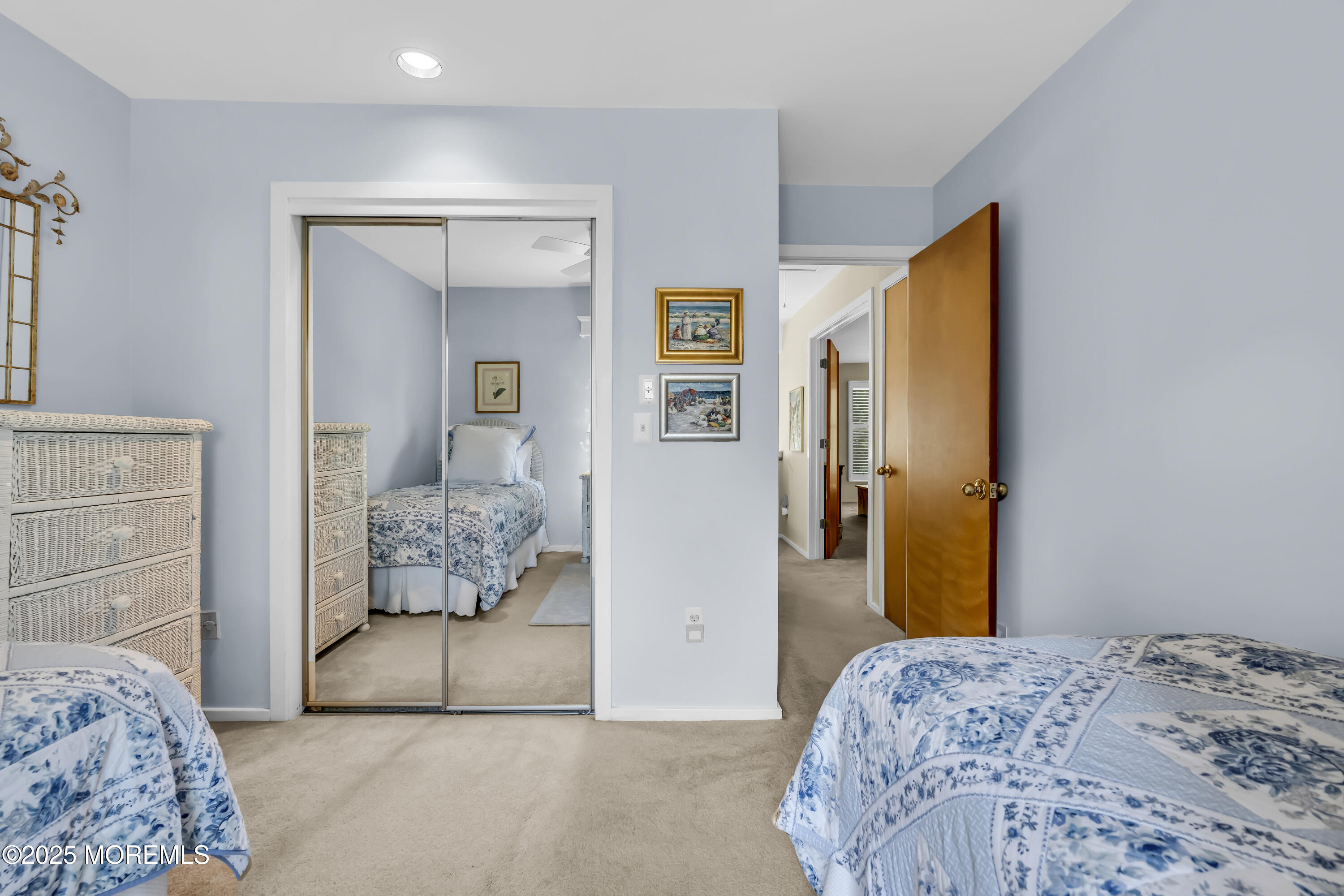 1301 Warren Avenue, Unit 5 Spring Lake, NJ 07762 - Photo 37 of 51 a bedroom with a bed and a dresser in it