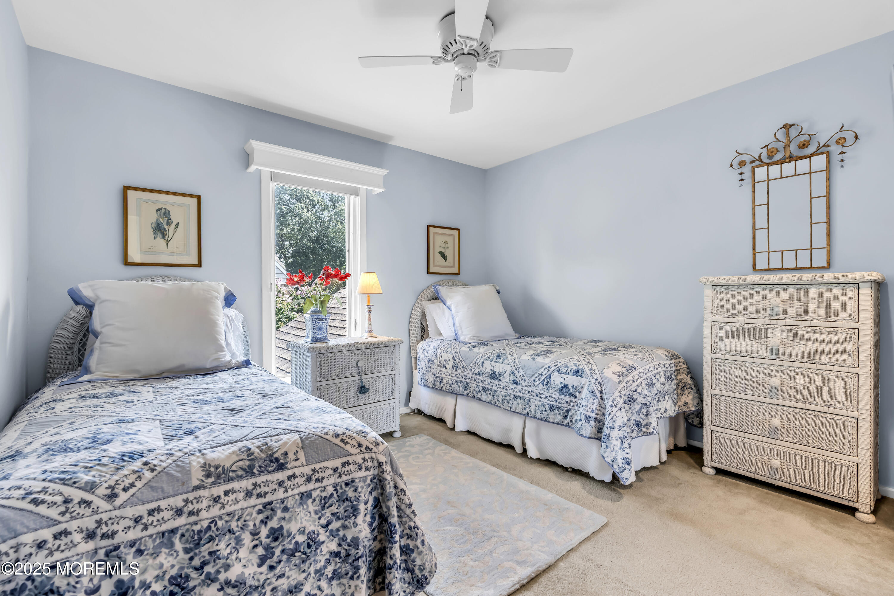1301 Warren Avenue, Unit 5 Spring Lake, NJ 07762 - Photo 38 of 51 a bedroom with a bed a dresser and painting on the wall