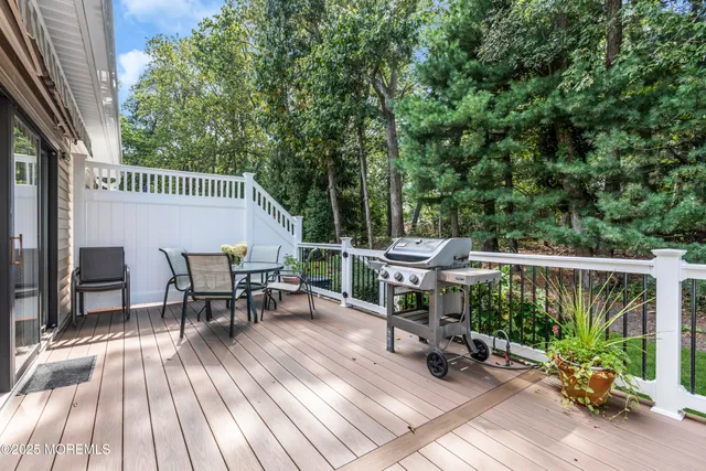 a view of a chairs and table in the patio