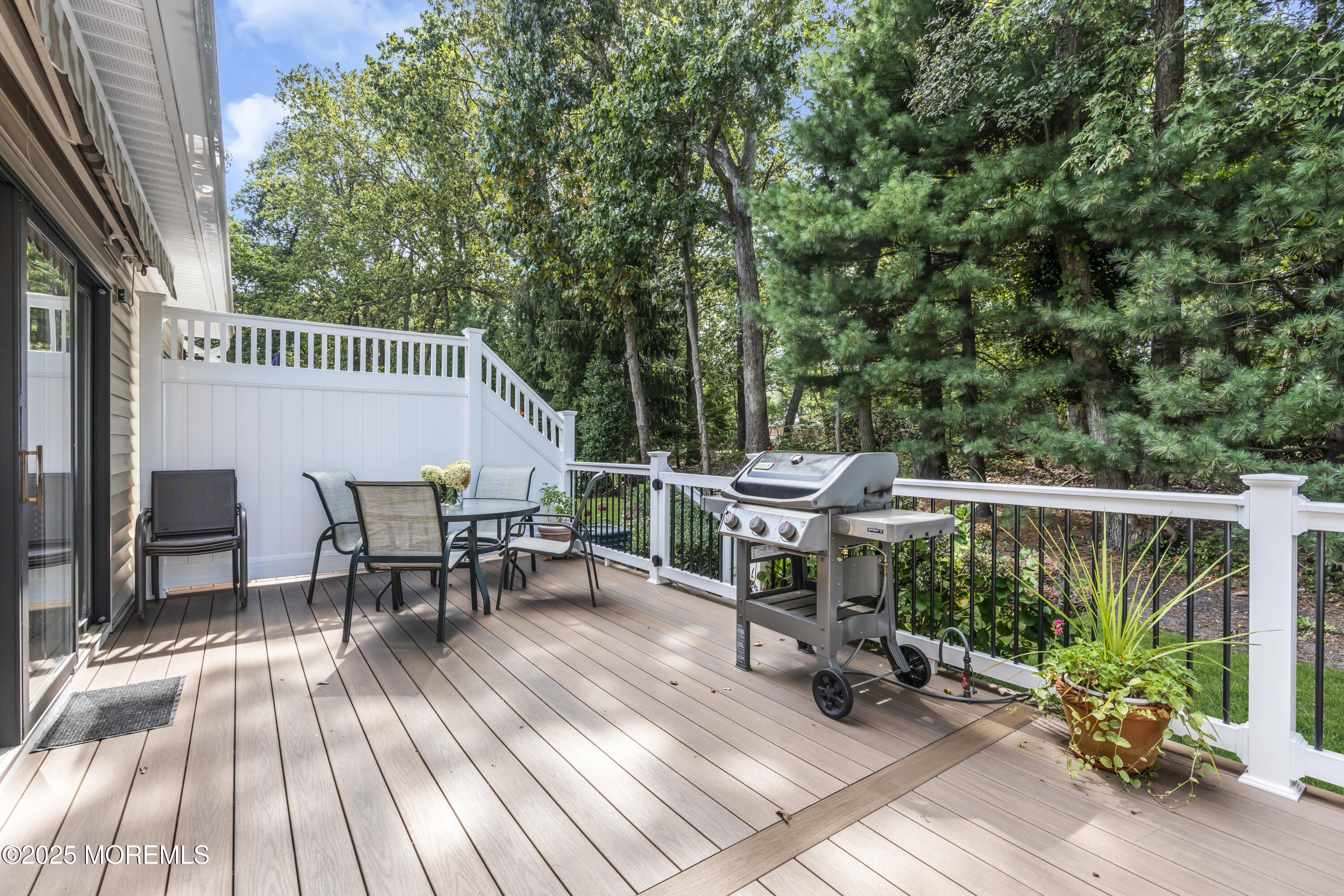 1301 Warren Avenue, Unit 5 Spring Lake, NJ 07762 - Photo 46 of 51 a view of a chairs and table in the patio