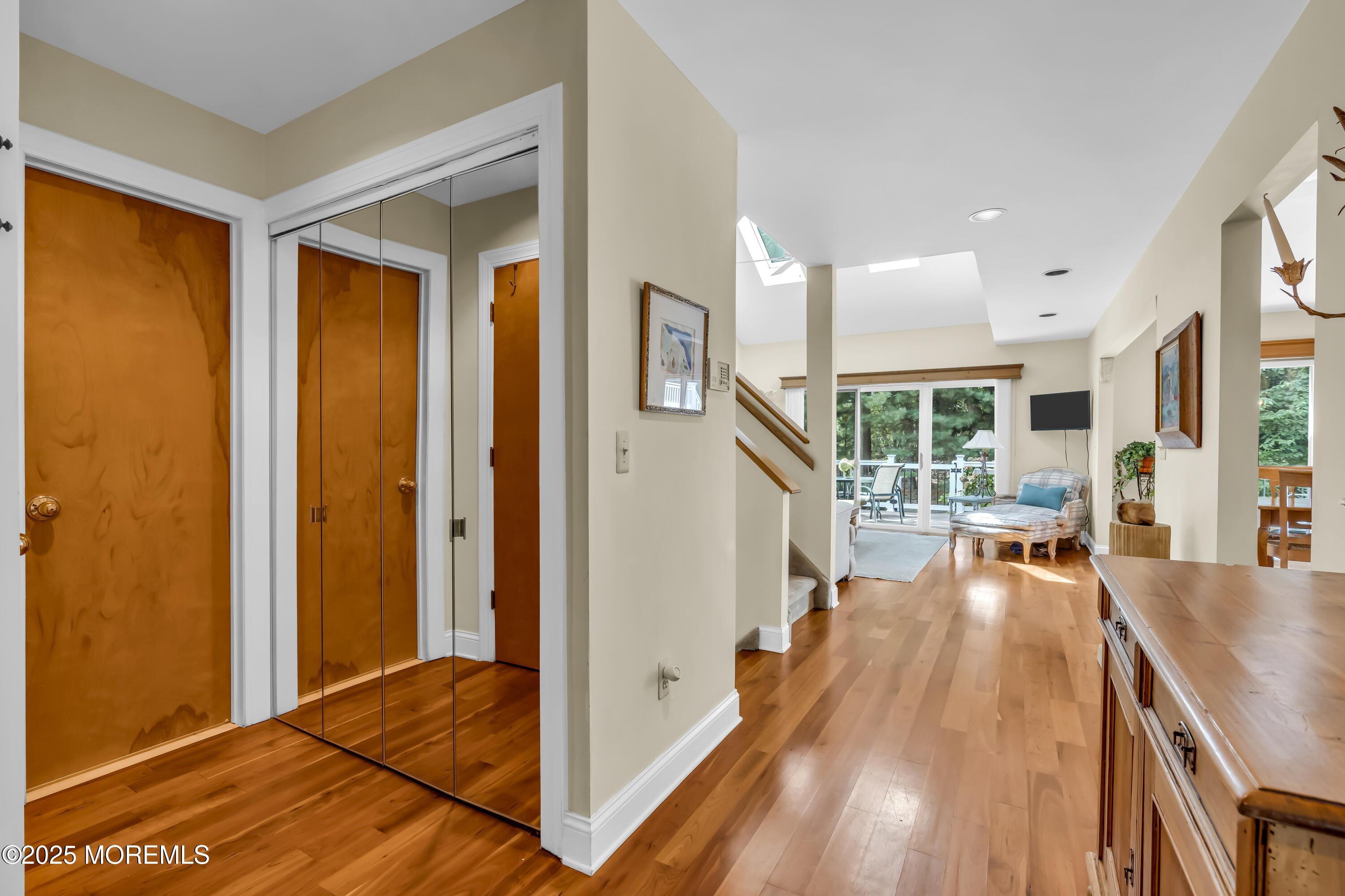 1301 Warren Avenue, Unit 5 Spring Lake, NJ 07762 - Photo 6 of 51 a very nice looking room with a large window and wooden floor