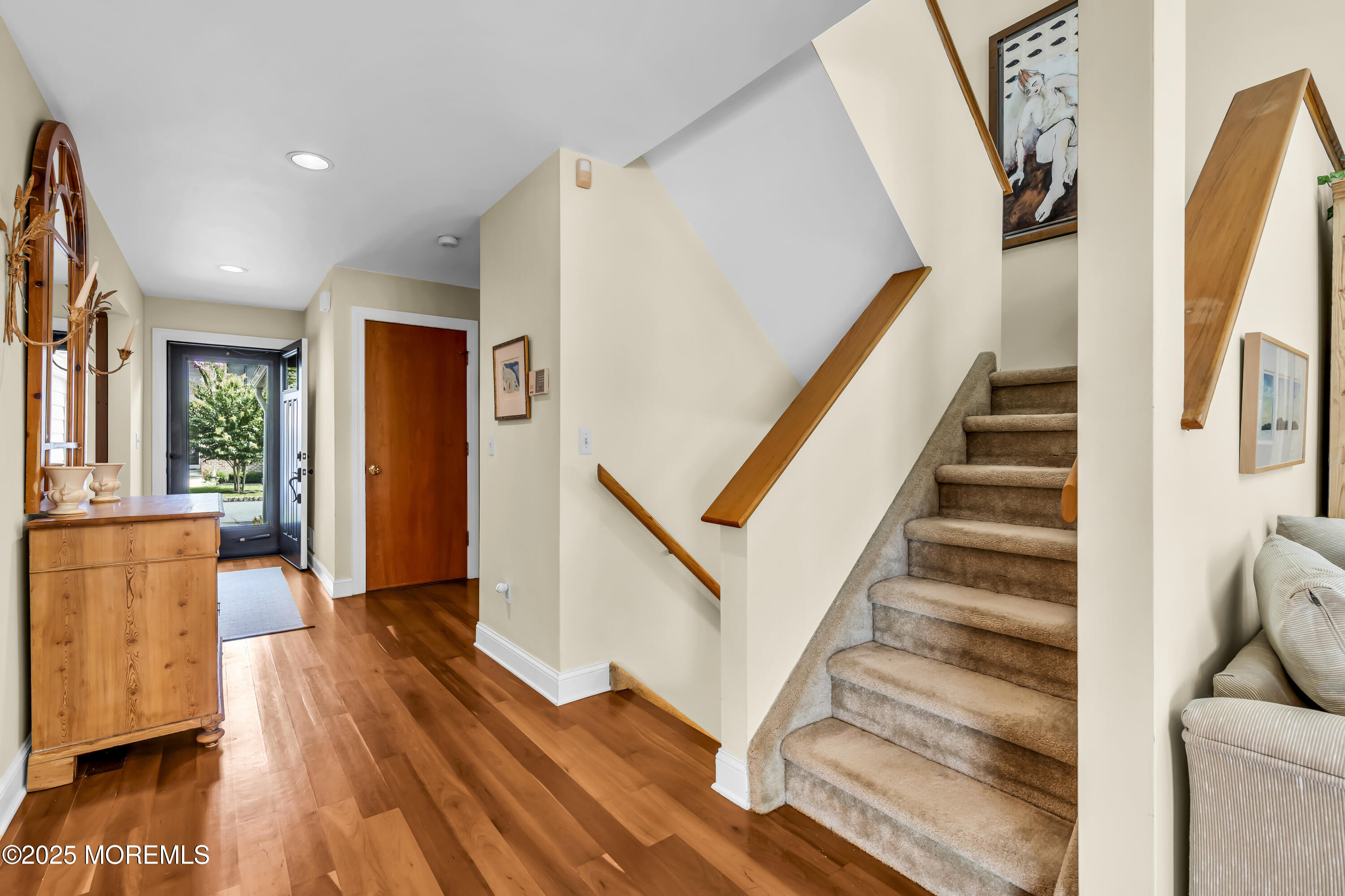 1301 Warren Avenue, Unit 5 Spring Lake, NJ 07762 - Photo 8 of 51 a view of entryway and hall with wooden floor