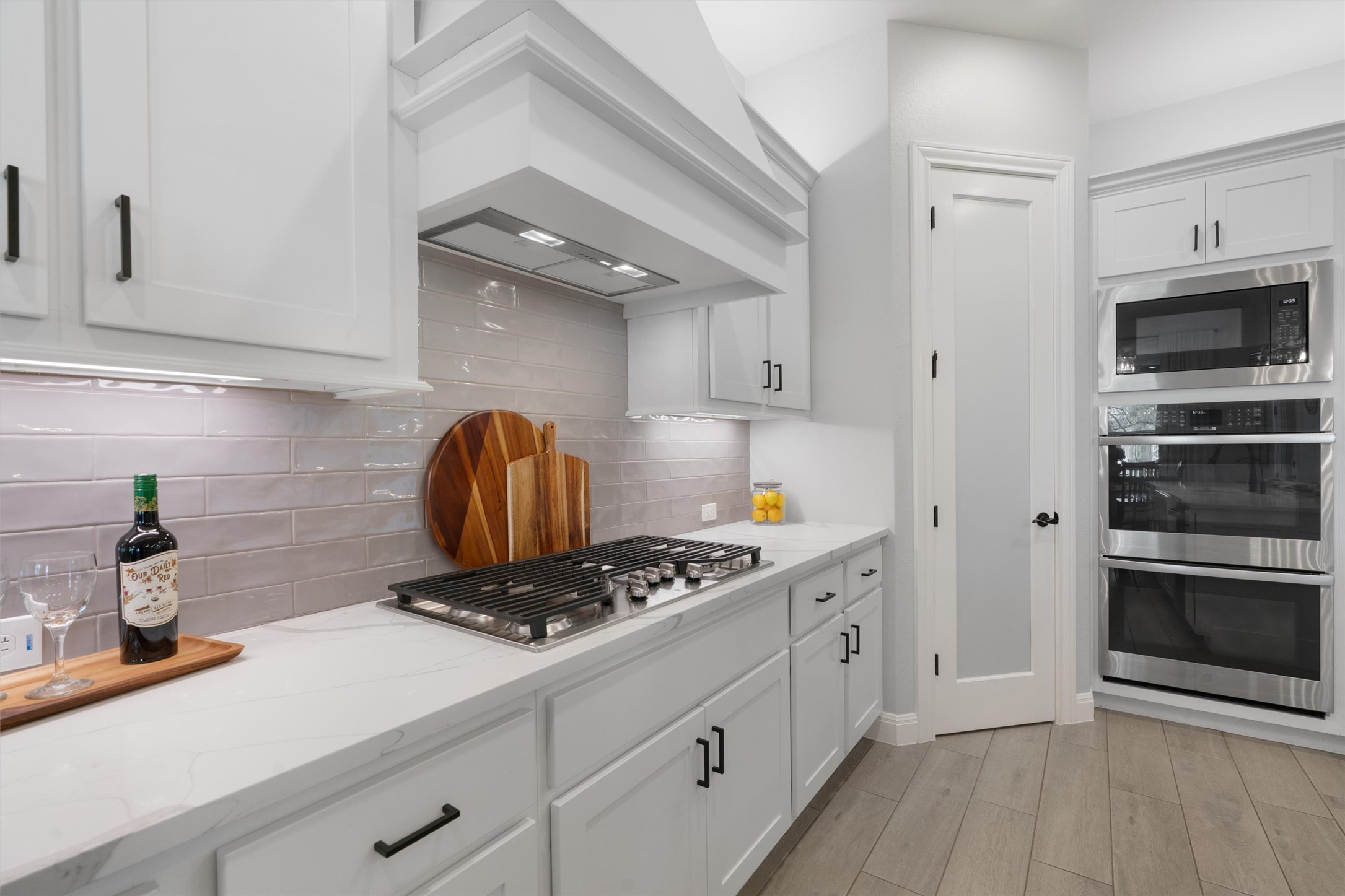 210 Miranda Way Georgetown, TX 78633 - Photo 13 of 40 The home chef will appreciate the gas range and built-in appliances, including double ovens!