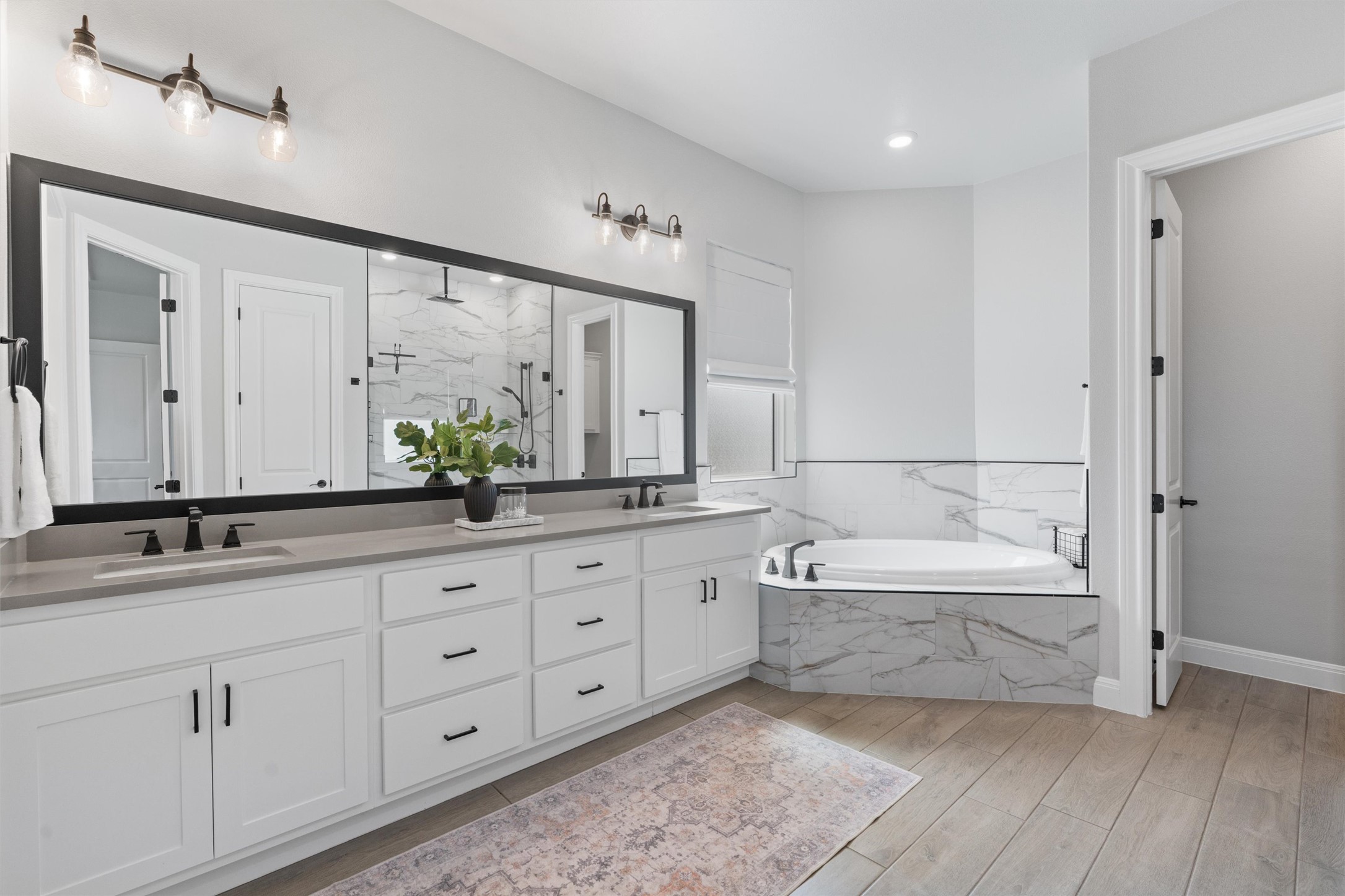 210 Miranda Way Georgetown, TX 78633 - Photo 18 of 40 The primary is complete with a spa-inspired ensuite bath.