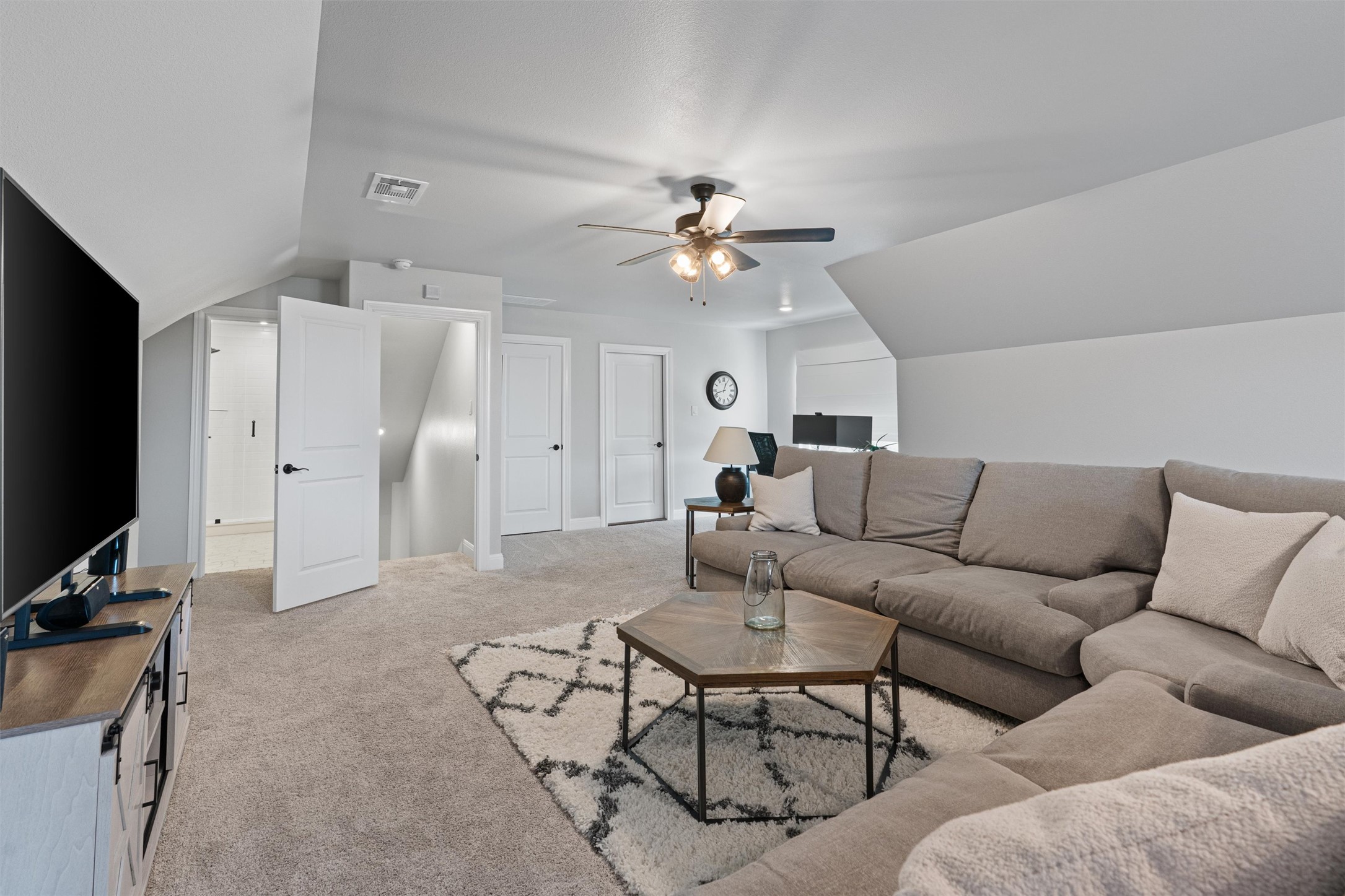 210 Miranda Way Georgetown, TX 78633 - Photo 26 of 40 The second level is a spacious bonus room with 2 finished out walk-in attic spaces for storage & 2 large closets going across each side wall. So much space for storage!